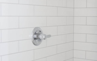 White subway tile in master bathroom